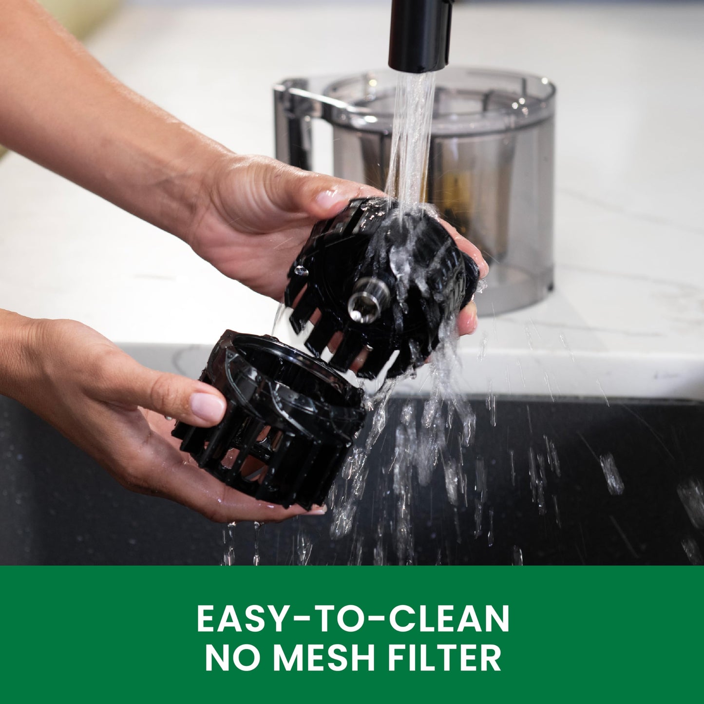 Person washing a black filter under running water with text 'Easy-to-clean No Mesh Filter' at the bottom.