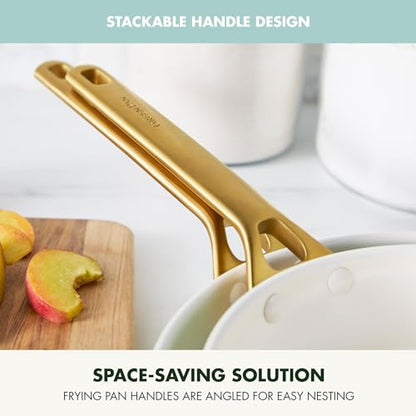 Gold frying pan handle with text highlighting stackable design and space-saving solution.
