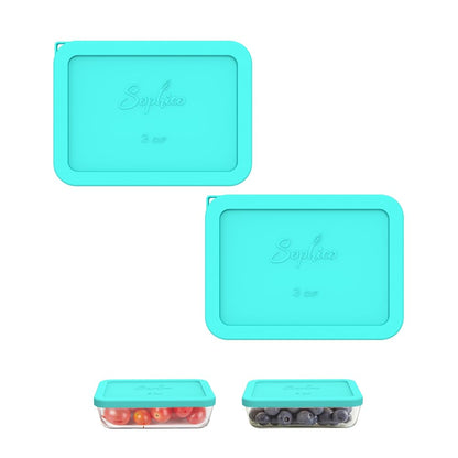 Set of teal silicone food containers with lids on a white background