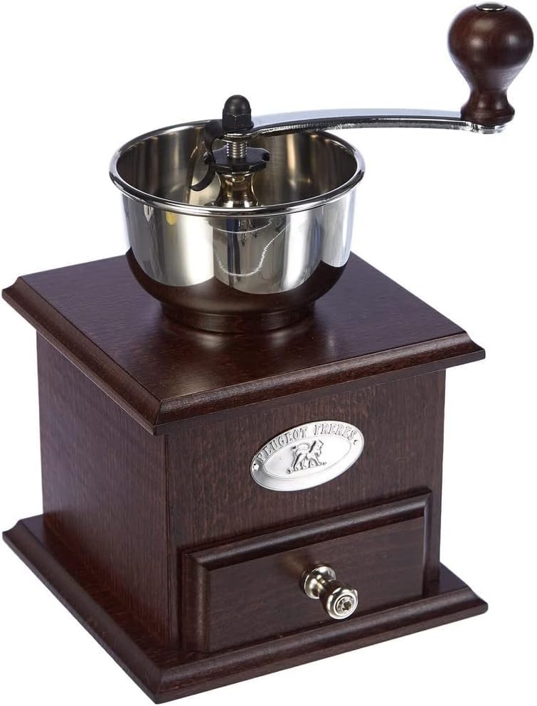 Peugeot bresil coffee mill with metal bowl and handle on a white background