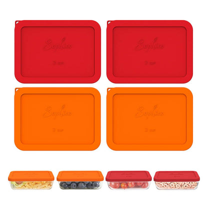 Set of four silicone food storage containers with red and orange lids on a white background.