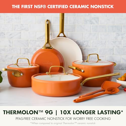 Set of orange cookware with gold handles on a white surface, featuring text about NSF certification and Thermolon material.