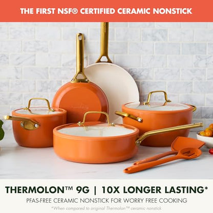 Set of orange cookware with gold handles on a white surface, featuring text about NSF certification and Thermolon material.