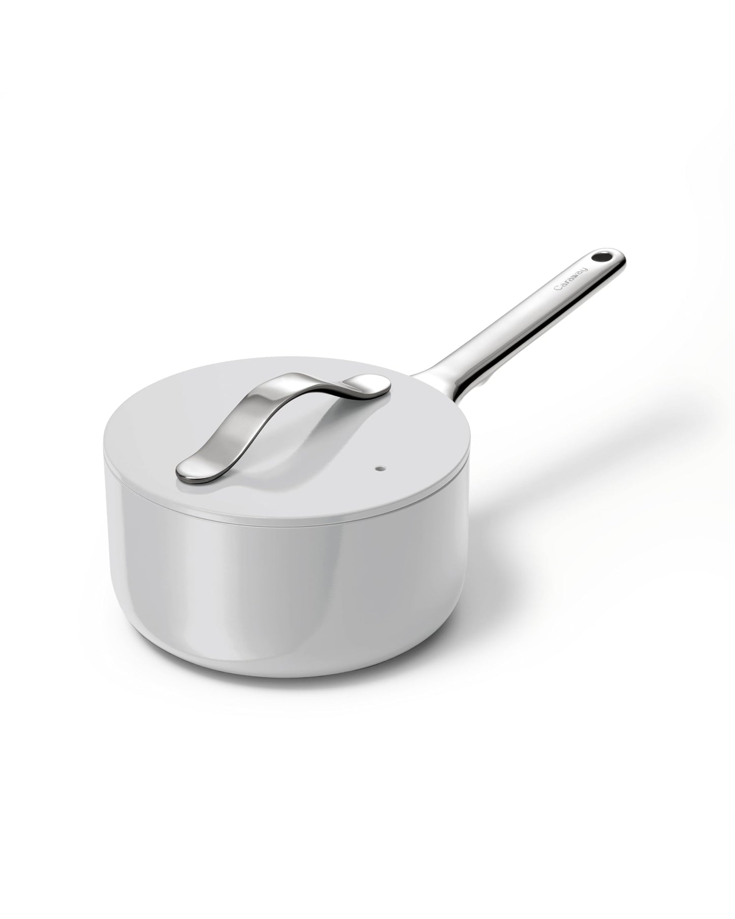 White saucepan with a silver handle on a white background