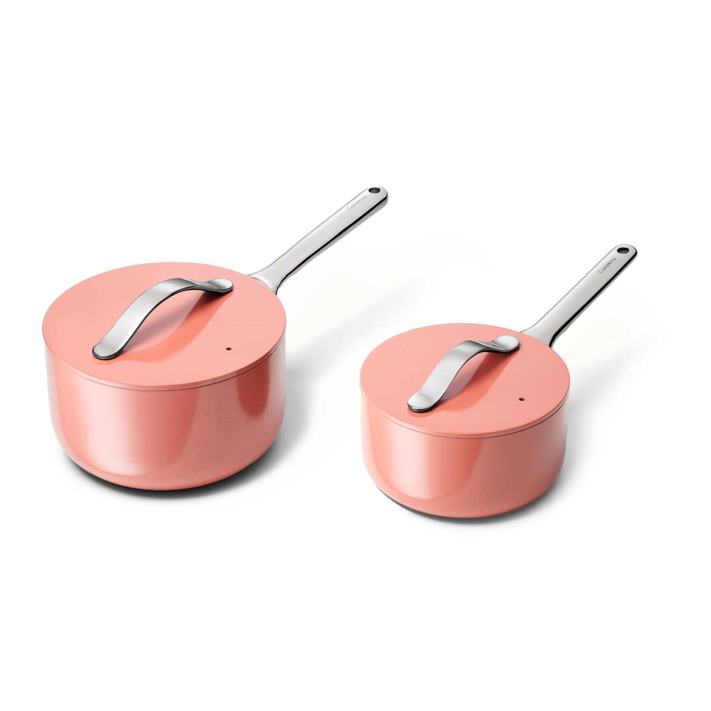 Two pink cookware items with silver handles on a white background