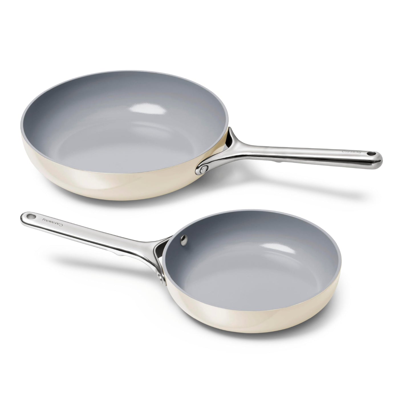 Two ceramic-coated frying pans on a white background