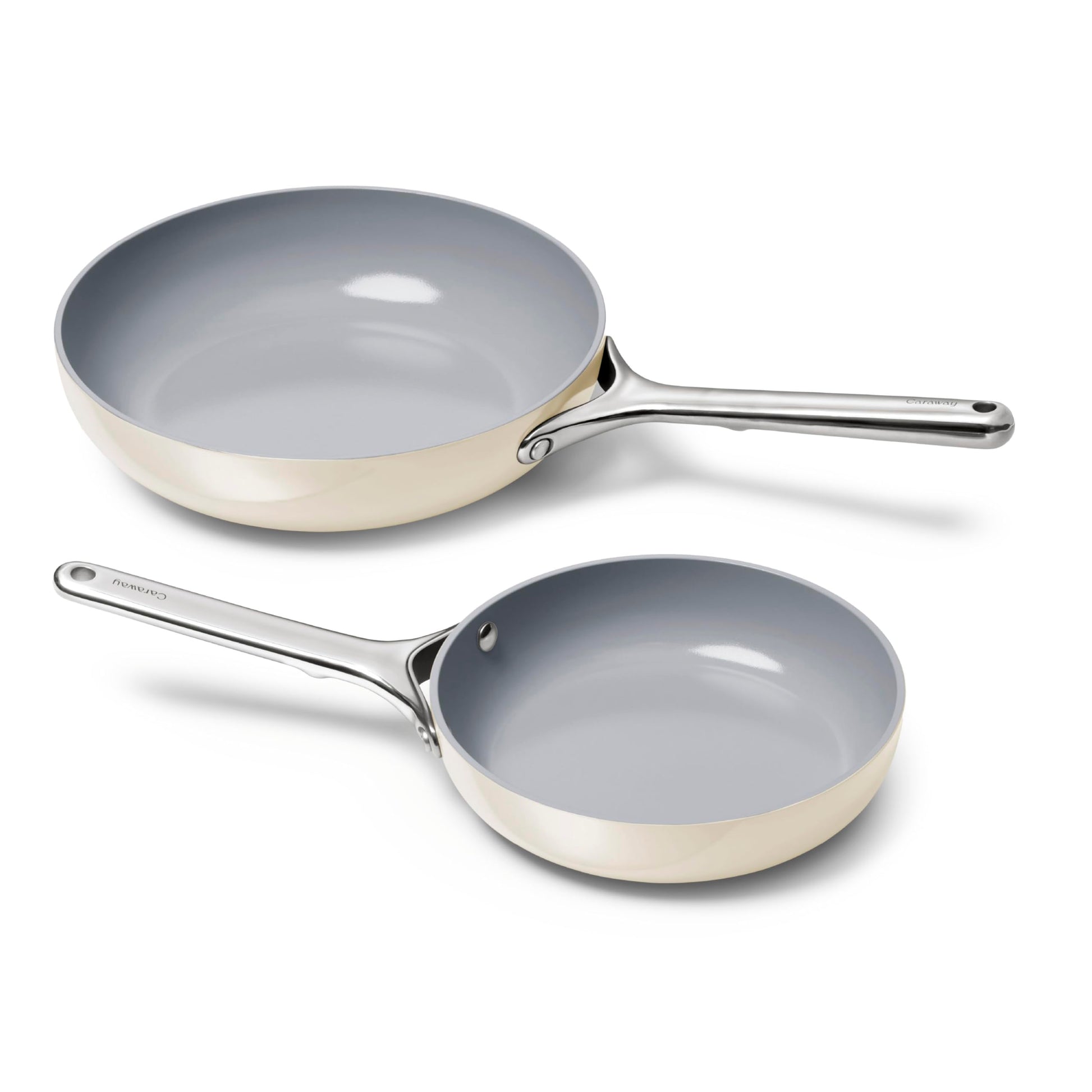 Two ceramic-coated frying pans on a white background