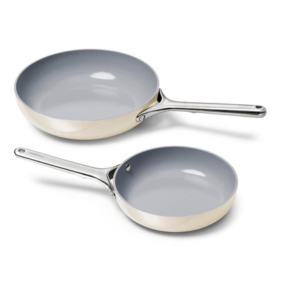 Two ceramic-coated frying pans on a white background