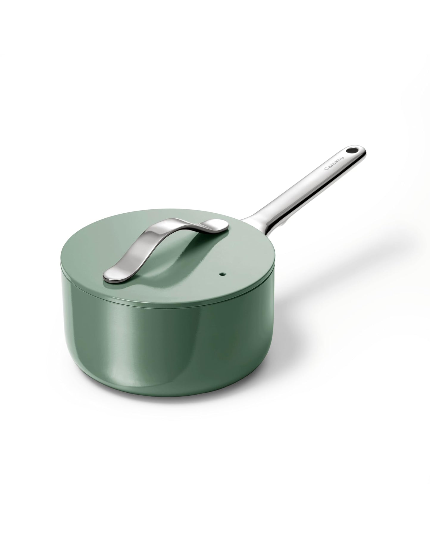 Green saucepan with a silver handle on a white background