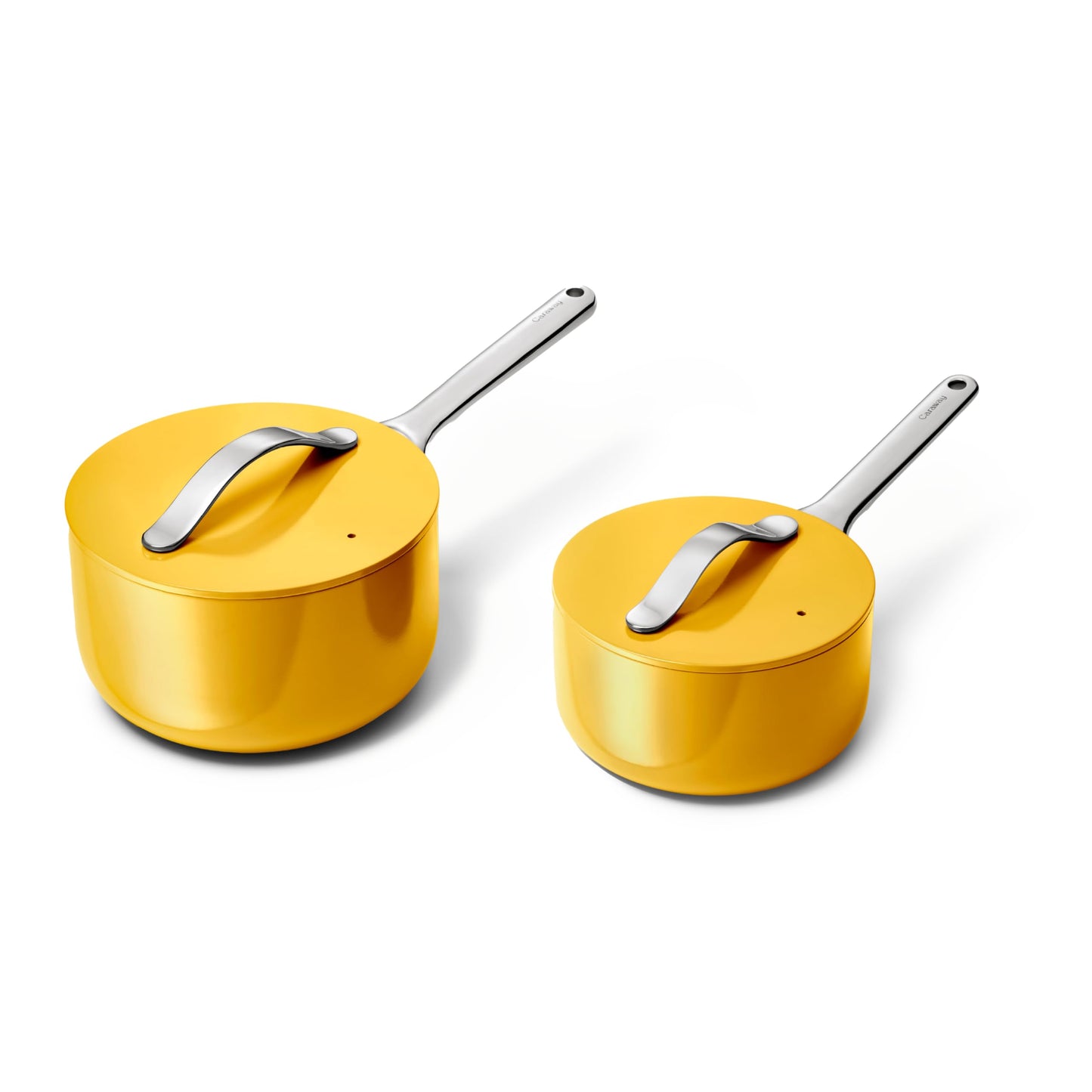 Two yellow cookware pots with lids on a white background