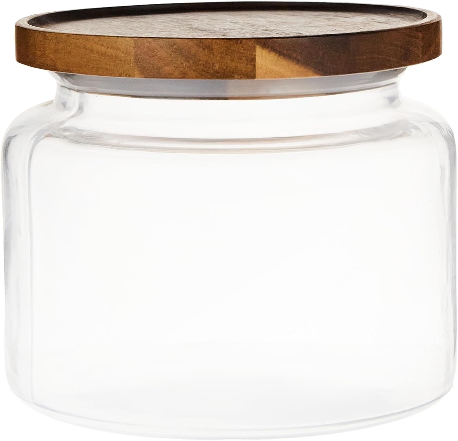 Clear glass jar with a wooden lid on a white background