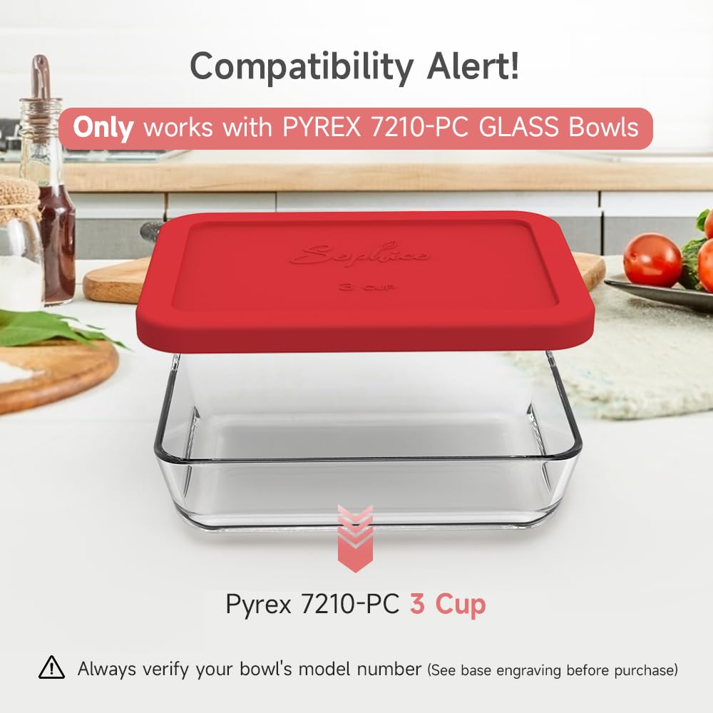 Pyrex glass bowl with a red lid on a kitchen counter, featuring compatibility alert text.