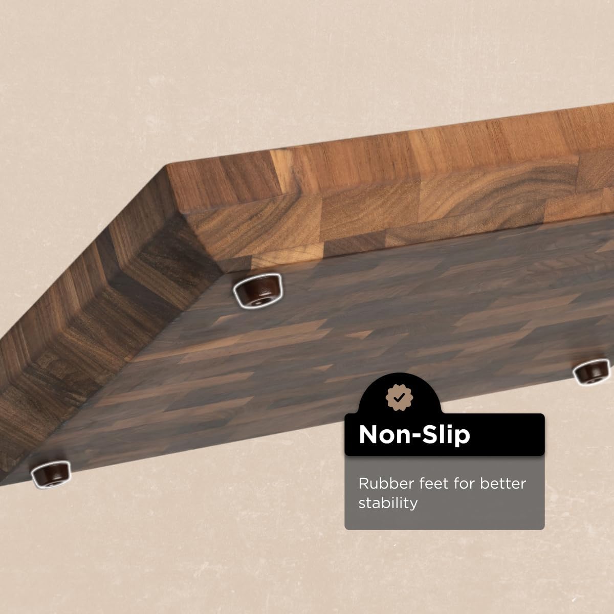 Wooden table with non-slip rubber feet on a beige background