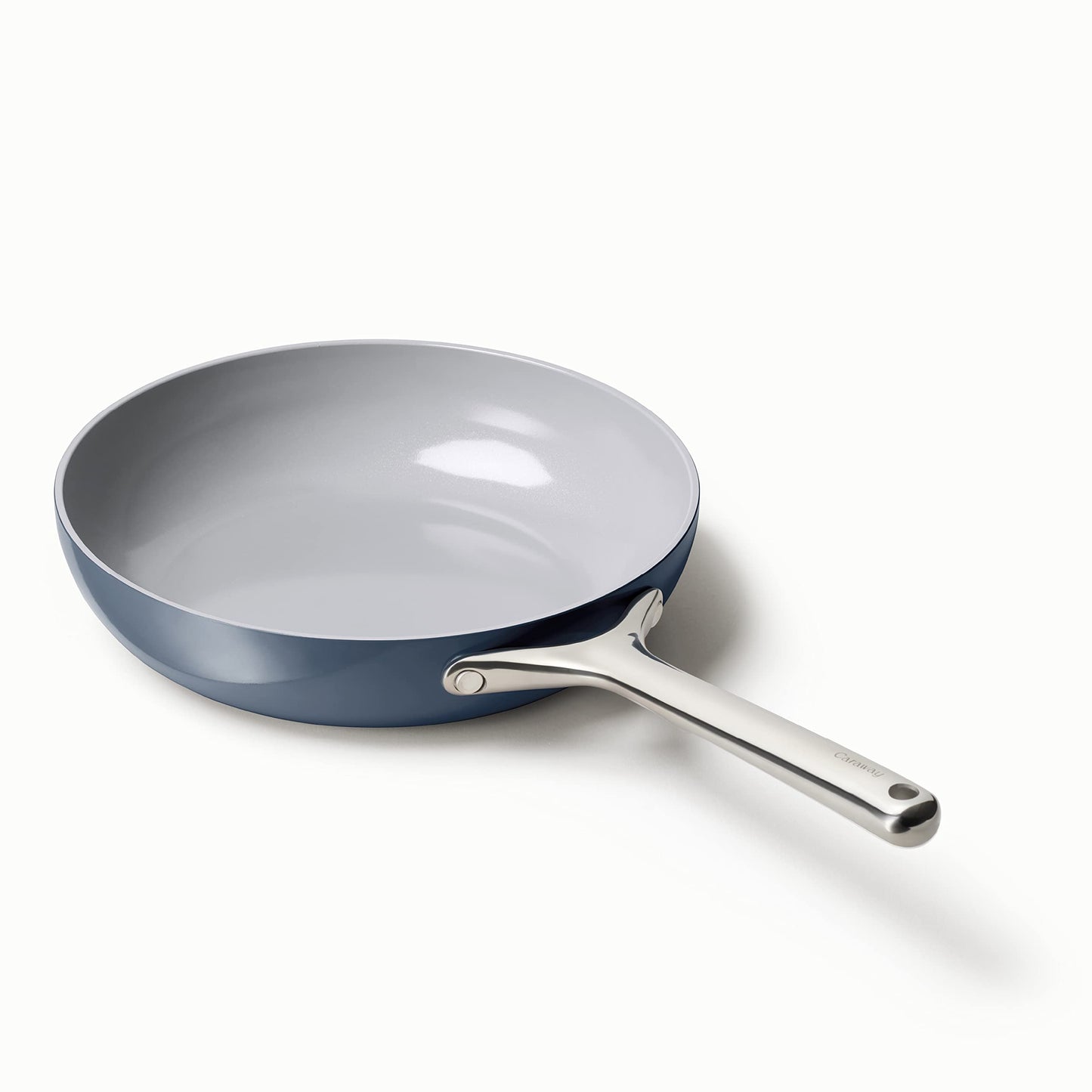 Blue frying pan with a silver handle on a white background