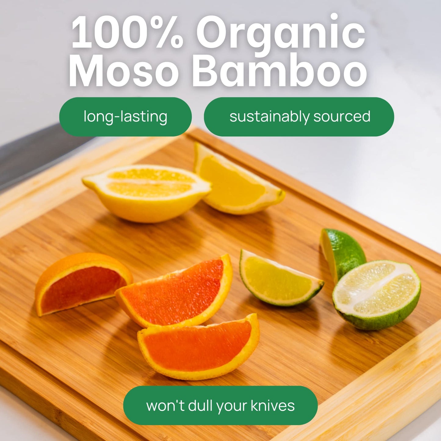 Wooden cutting board with sliced citrus fruits and promotional text about organic Moso Bamboo.