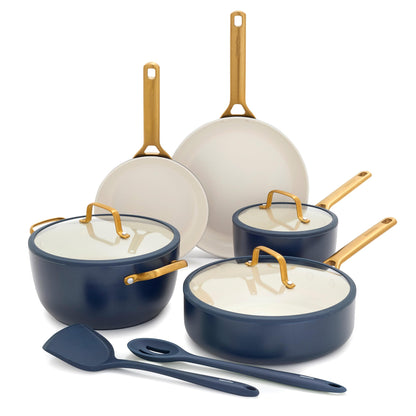 Set of blue cookware with gold handles on a white background