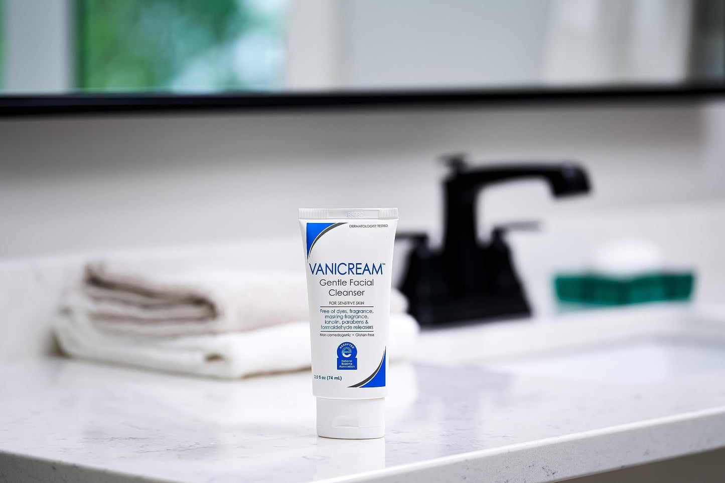 Vanicream tube on a bathroom counter with a blurred background