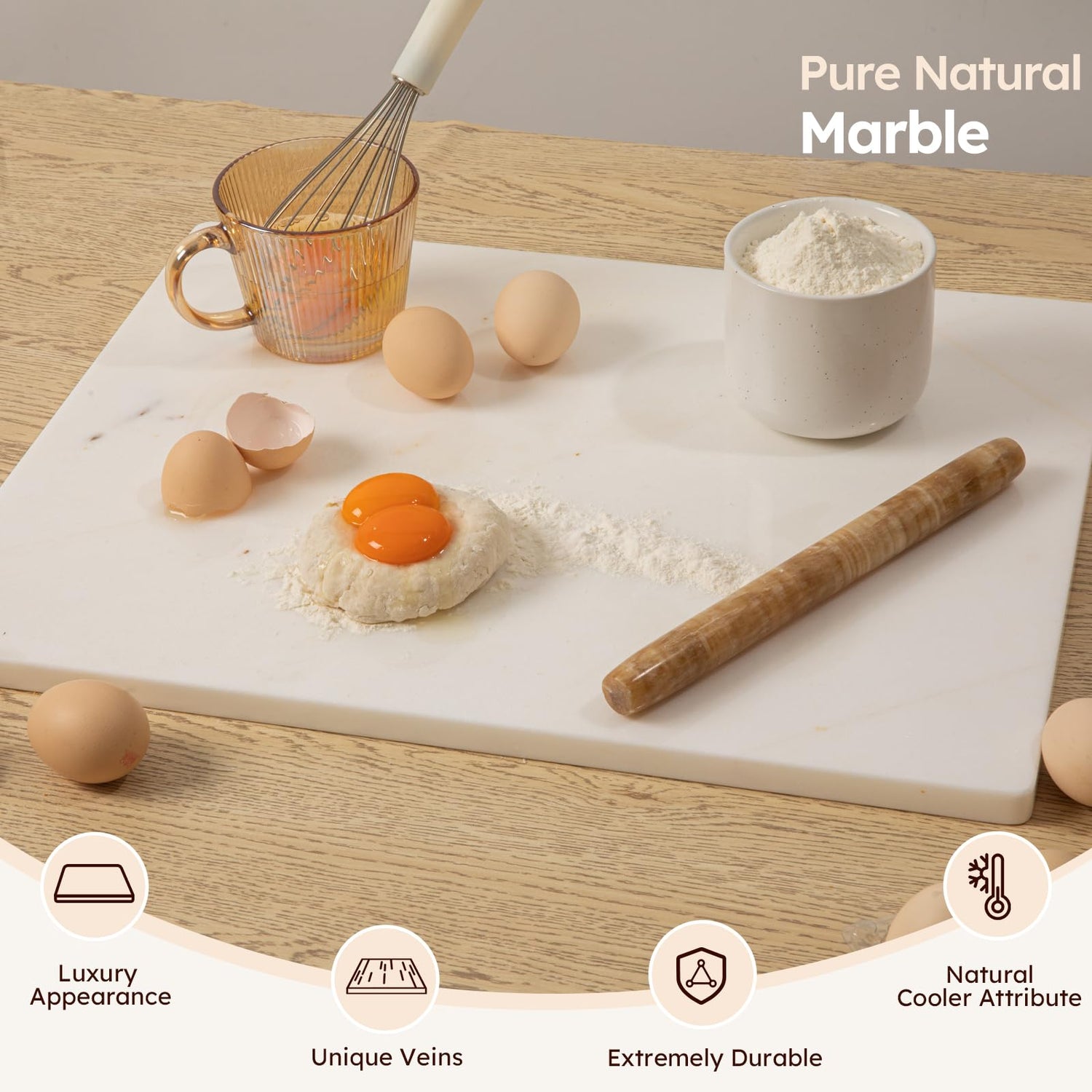 Marble cutting board with kitchen items on a wooden surface, labeled 'Pure Natural Marble'.