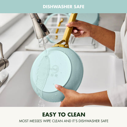 Person washing a light blue lid under running water with text indicating it is dishwasher safe and easy to clean.