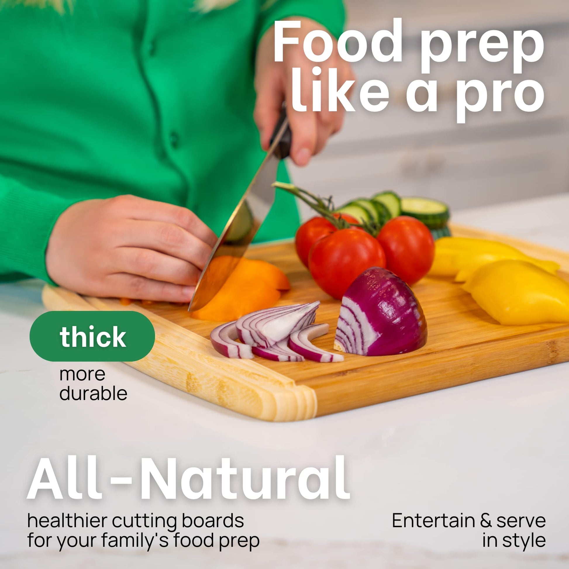 Person cutting vegetables on a wooden cutting board with text about thick, durable, all-natural cutting boards.