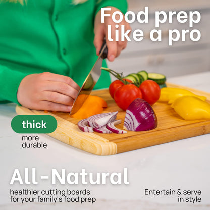Person cutting vegetables on a wooden cutting board with text about thick, durable, all-natural cutting boards.