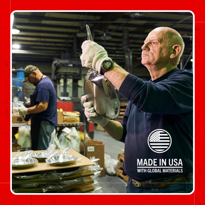 Man working in a warehouse with 'Made in USA with Global Materials' text on his shirt.