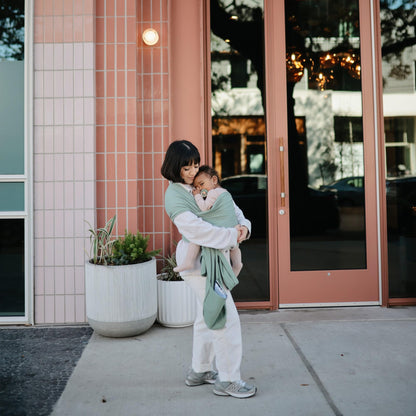 Mushie Organic Cotton Baby Wrap: Soft Roman Green Sling
