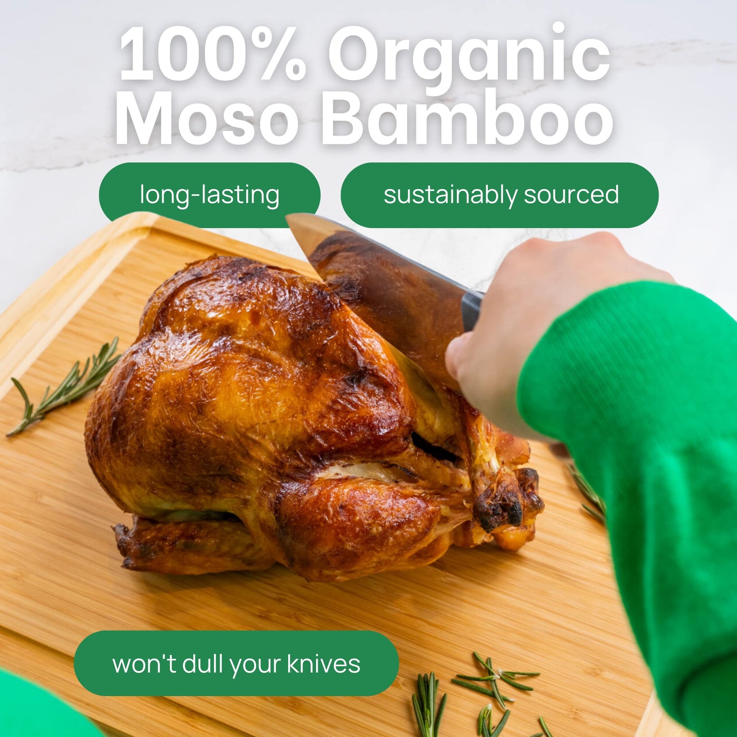 Roasted chicken on a cutting board with a hand holding a knife, promoting organic Moso Bamboo knives.