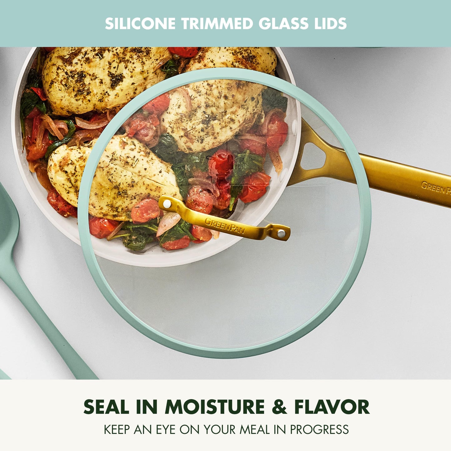 Glass lid with silicone trim on a pan of food, promoting moisture and flavor retention.