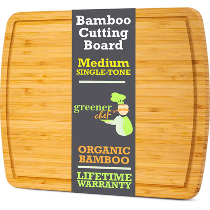 Bamboo cutting board with Greener Chef packaging on a white background