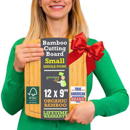Person holding a bamboo cutting board with a red bow, featuring product details on a white background.