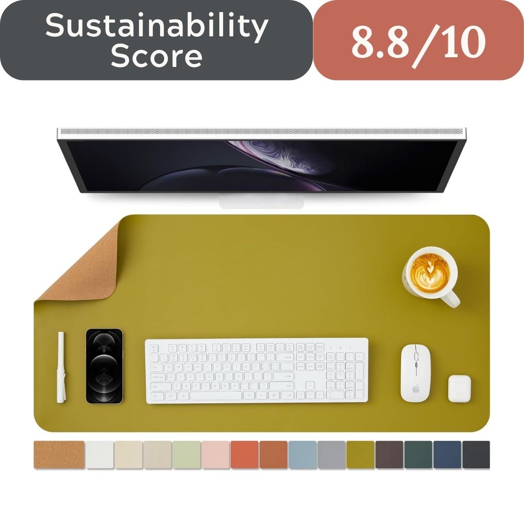 Desk setup with a monitor, keyboard, mouse, and cup of coffee on a large green desk mat, with a sustainability score displayed.