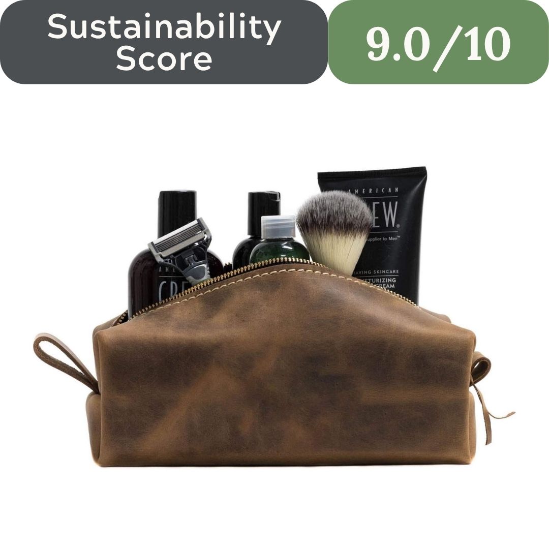 Brown leather toiletry bag with grooming products and sustainability score text overlay