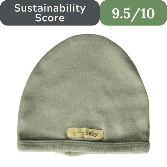 Green baby hat with a label on a white background, featuring a sustainability score.