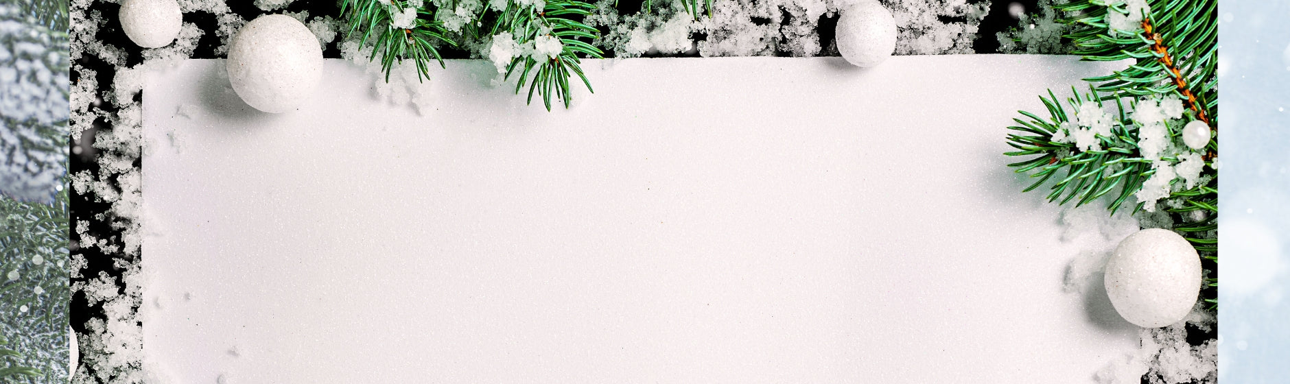 Blank white card with Christmas decorations on a snowy background