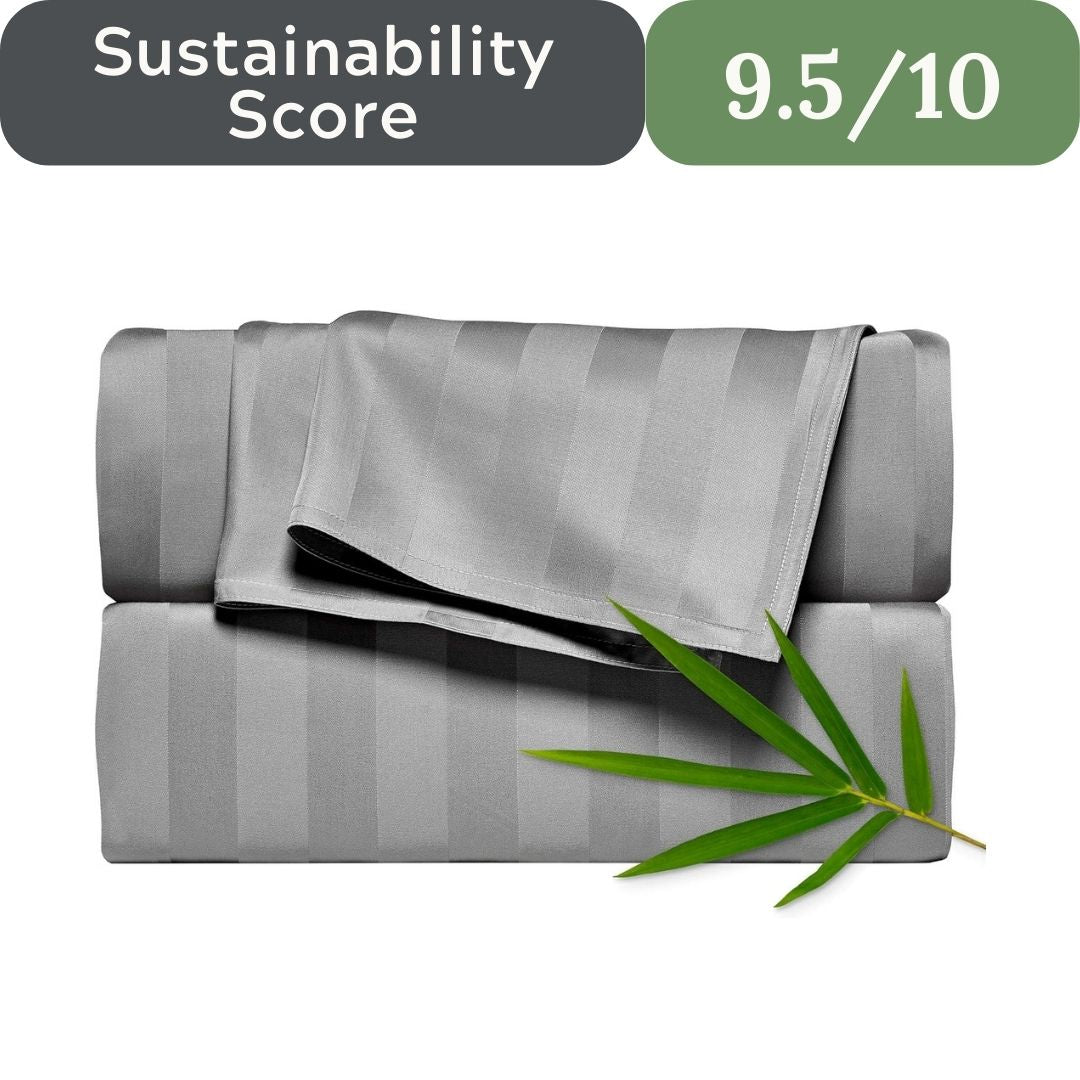 Gray striped bed sheets with a bamboo leaf on a white background, featuring a sustainability score of 9.5/10.