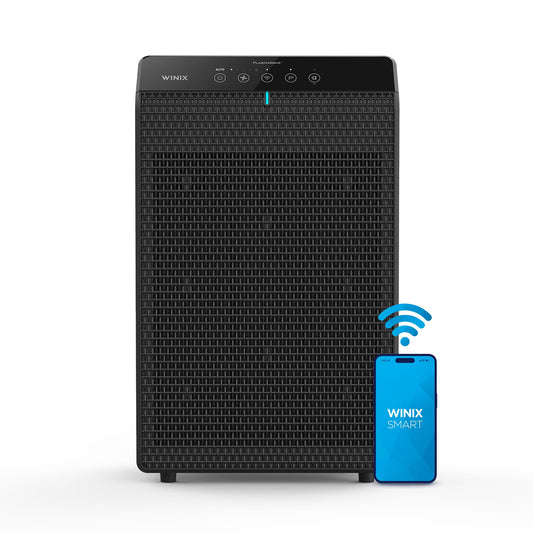 Black Winix air purifier with a blue remote control on a white background